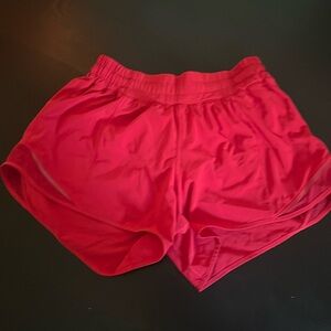 Red Lululemon shorts